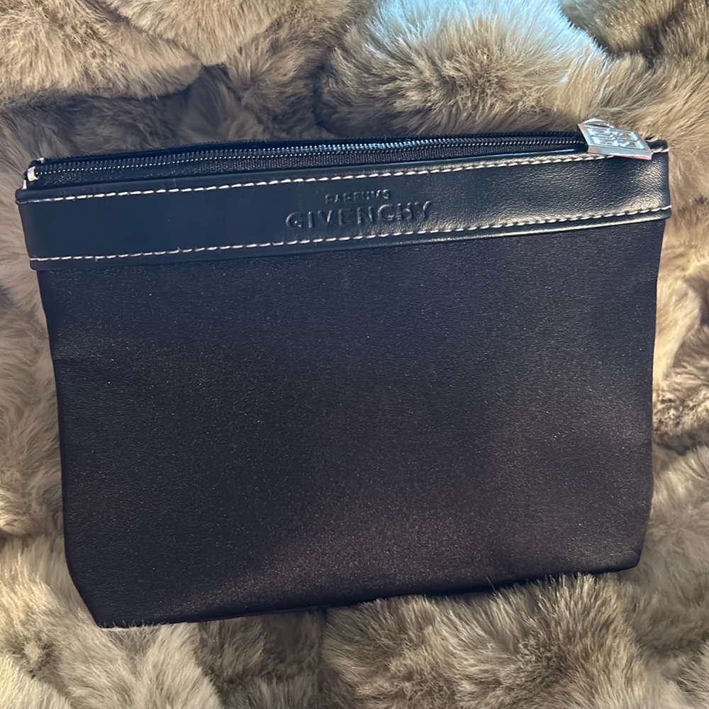 Givenchy black sleek scuba material makeup bag. Just enough for the essentials.